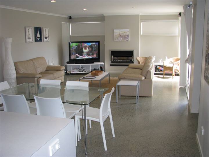 Lounge opens onto covered deck