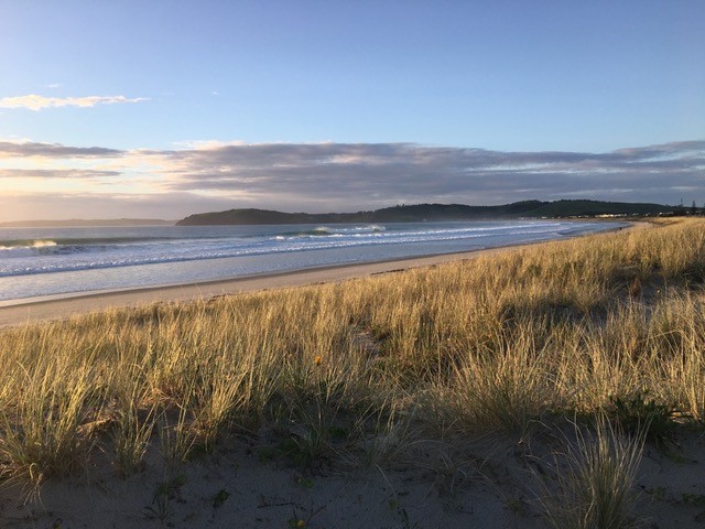THE BEACH AT SUNRISE