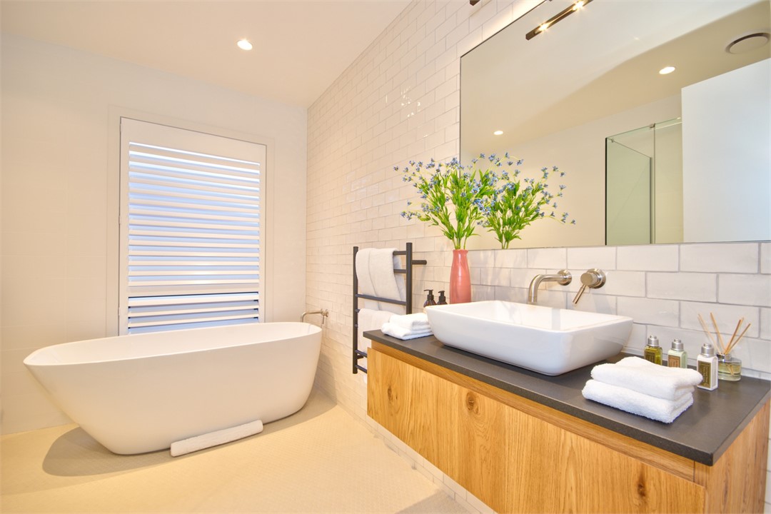 Family Bathroom with deep soaking tub and large sh