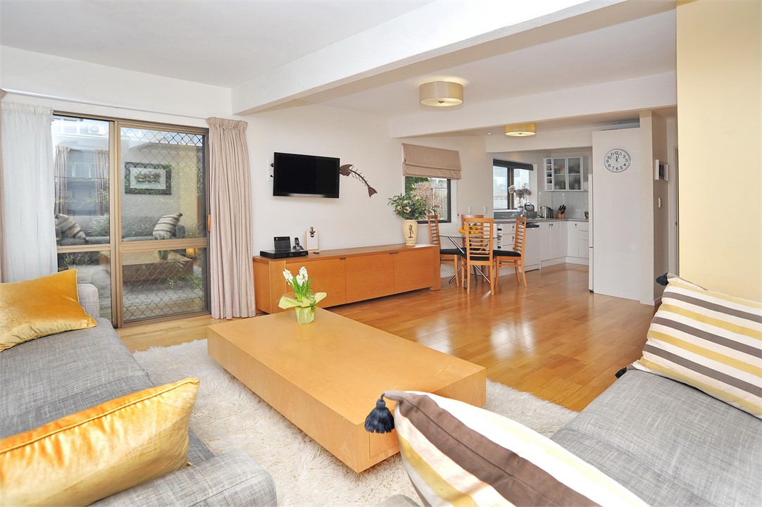 Living area has a TV and seating areas