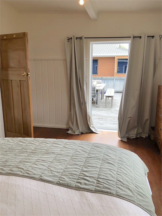Bedroom 1 - Double Bed - door to front deck