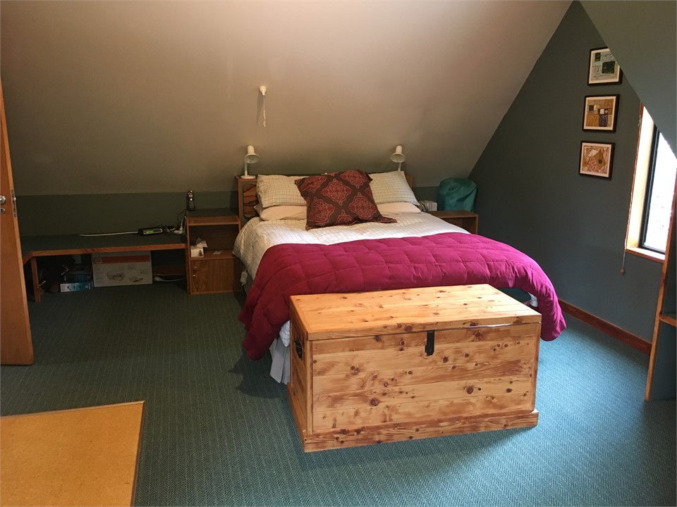 Master bedroom with queen bed