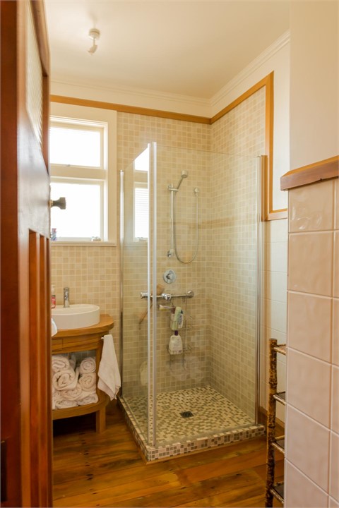 Bathroom with shower, toilet & vanity