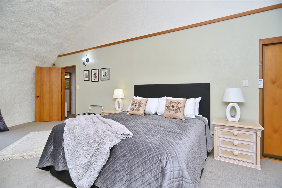 Bedroom 2 has a Queen bed