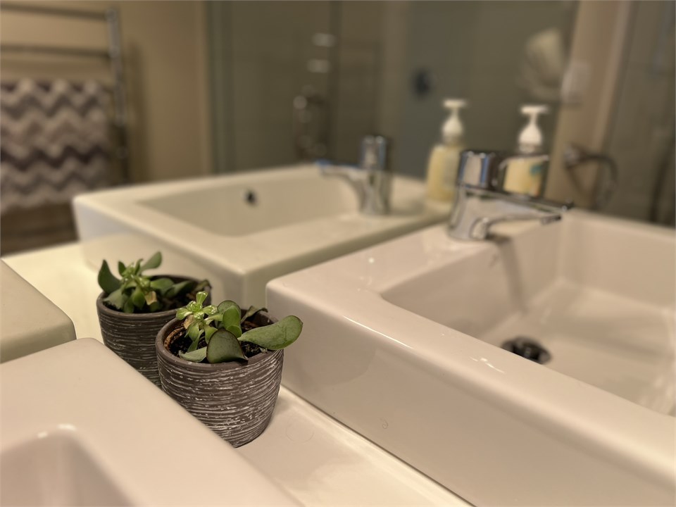 Bathroom 2 has a shower and a toilet