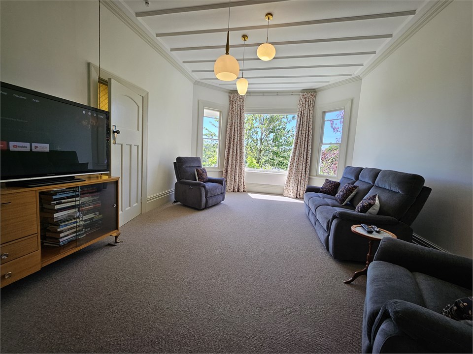 Lounge with electric reclining chairs