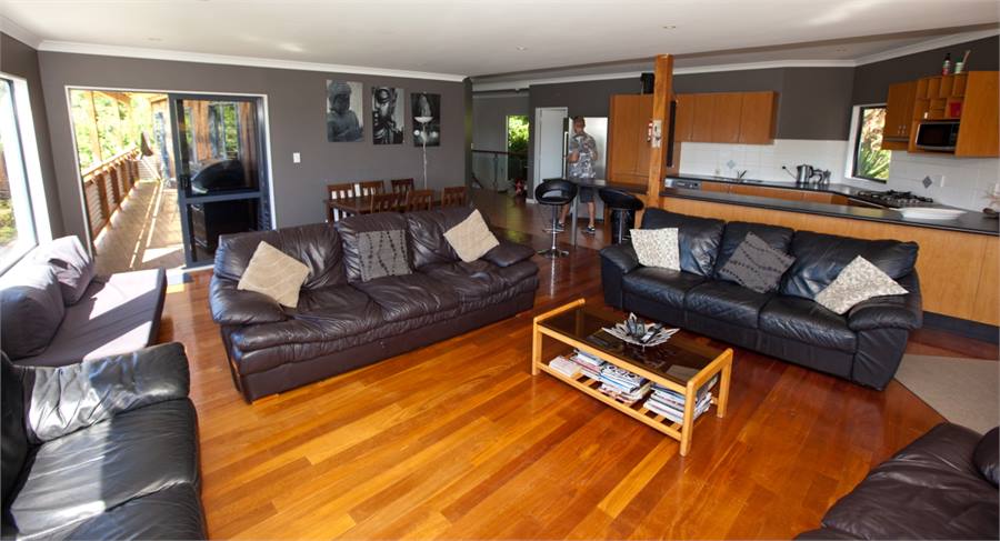 Lounge leads onto lower deck, bbq & bedrooms