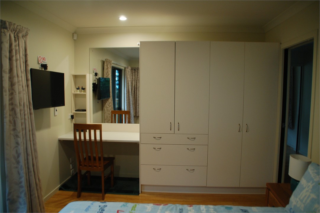 Master Bedroom with TV, Desk and plenty of storage