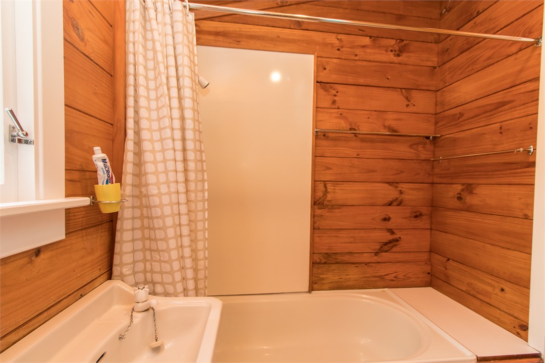 Bathroom with bath and shower . Additional shower 