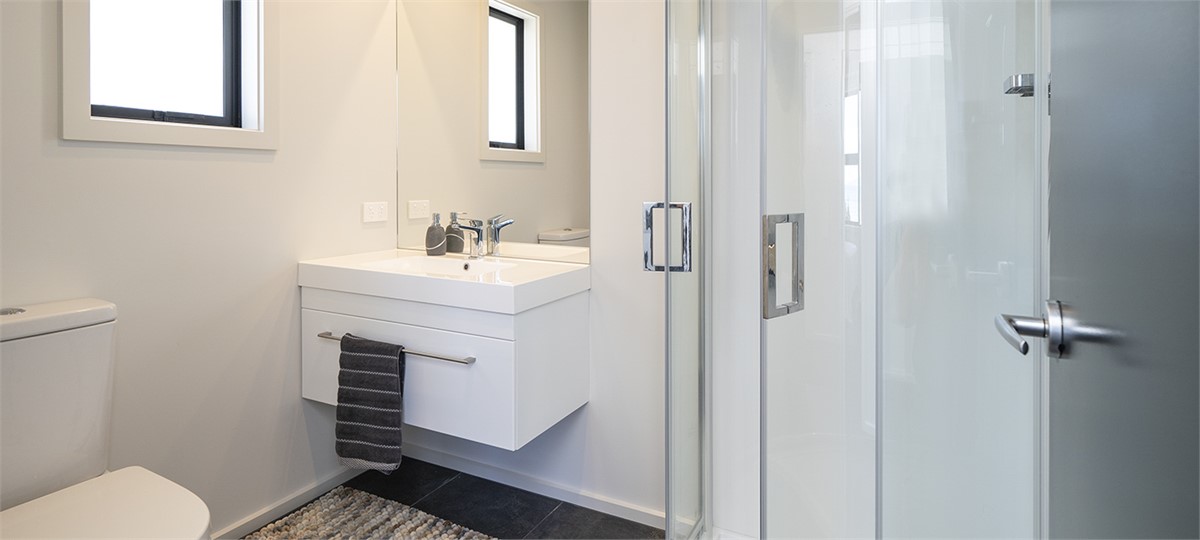 Bathroom 2 with shower & vanity. Separate toilet