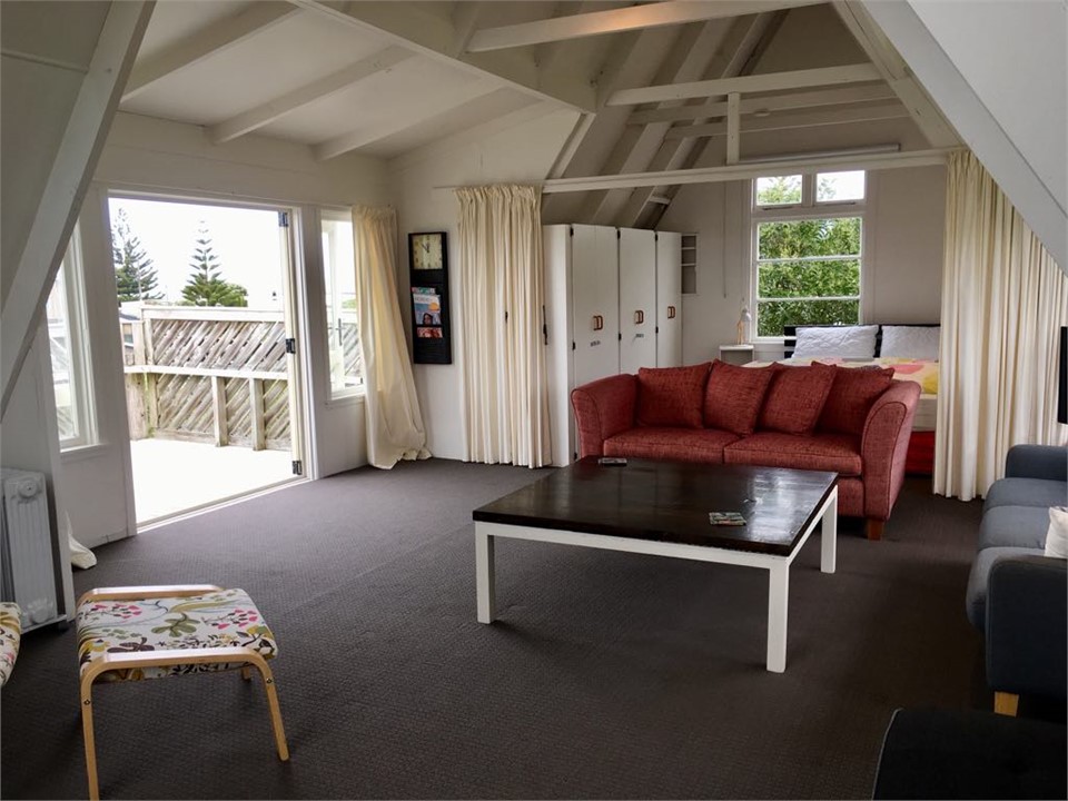 Living area with 3rd 'bedroom' at the end.