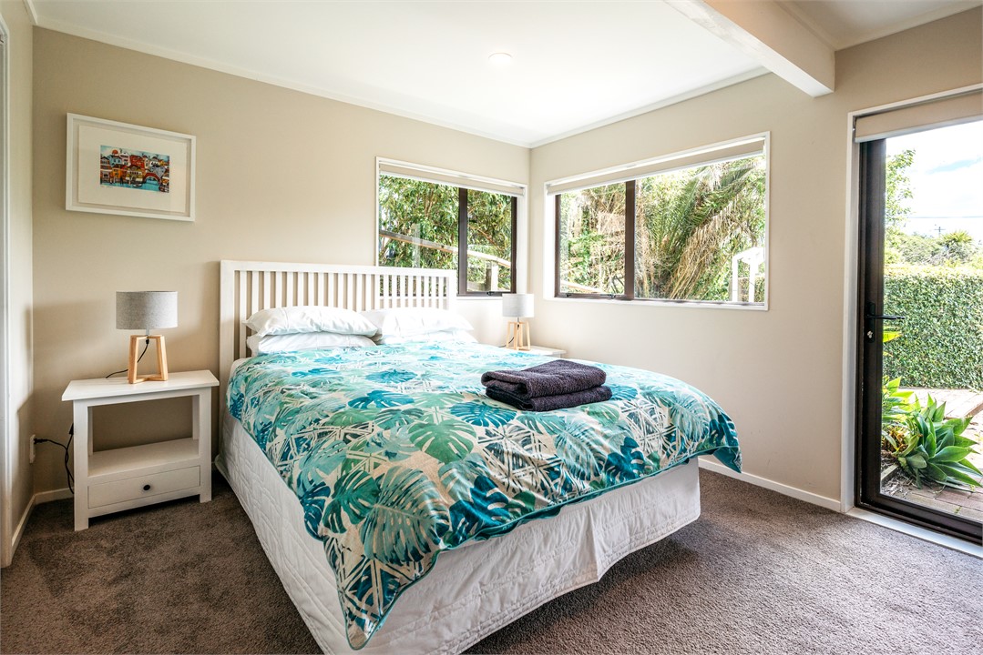Downstairs bedroom with ensuite and garden access.