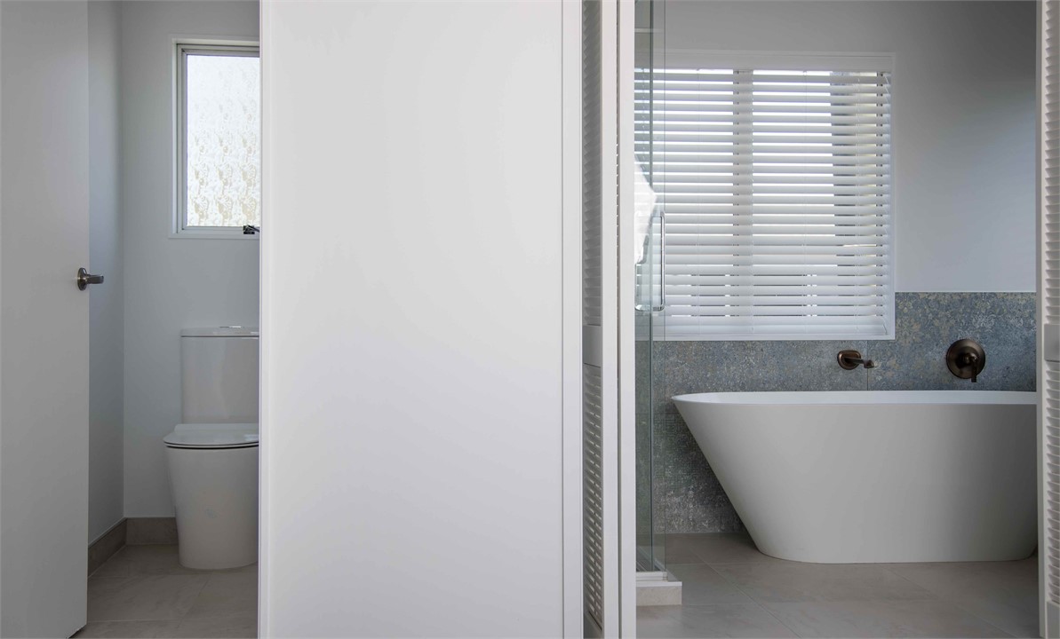 Toilet separate to bathroom