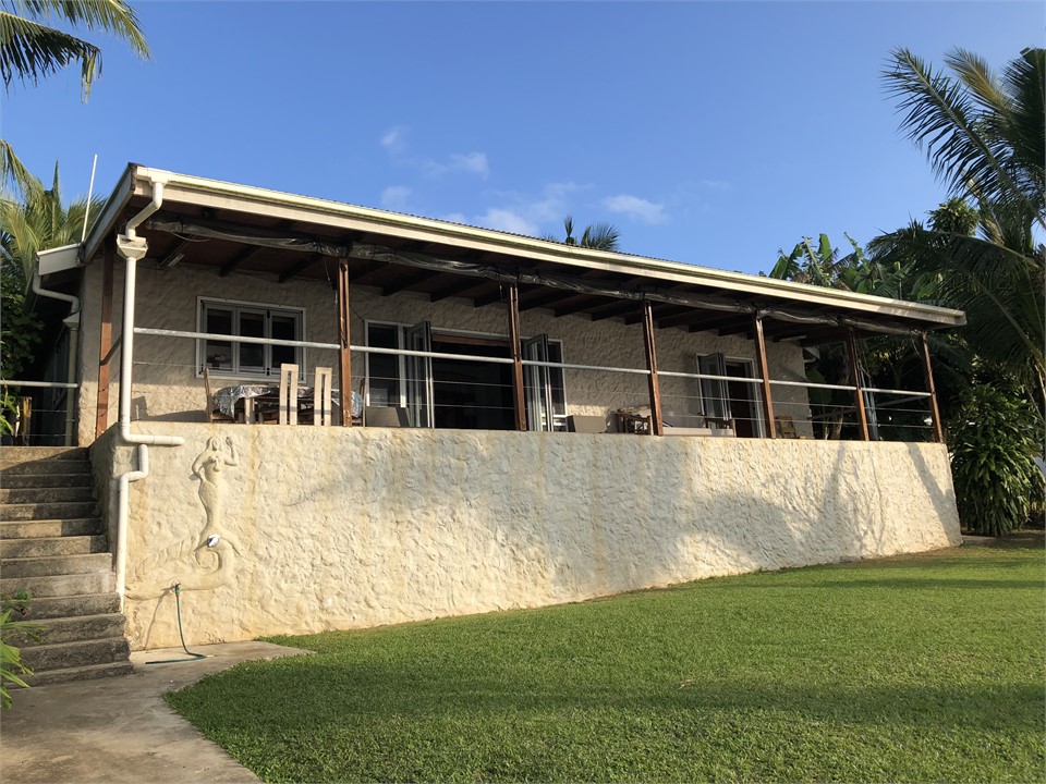 The whare, note outdoor mermaid shower