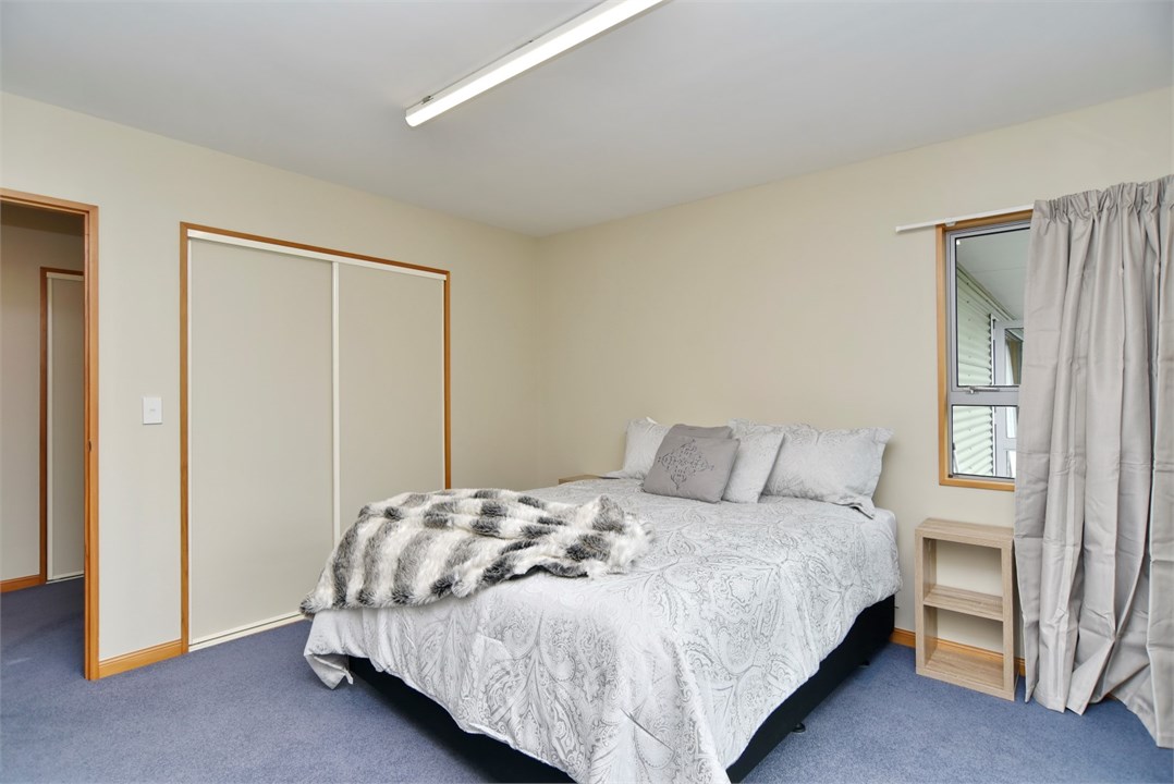 Bedroom 2 has a Queen bed