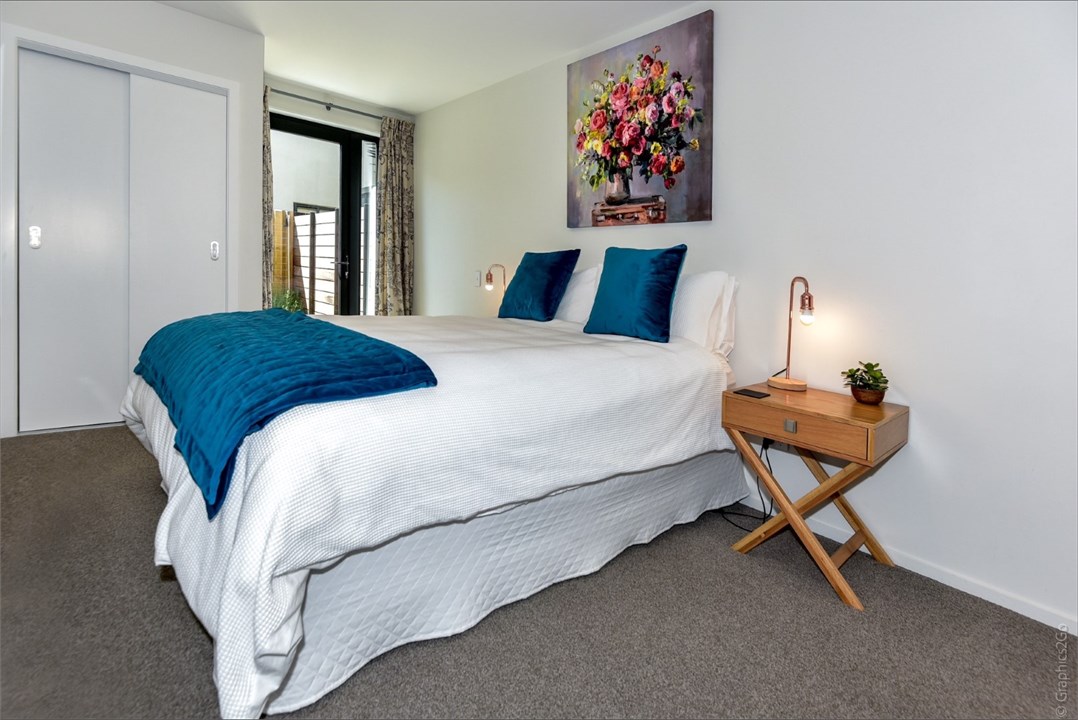 Bedroom 2 has a Queen bed