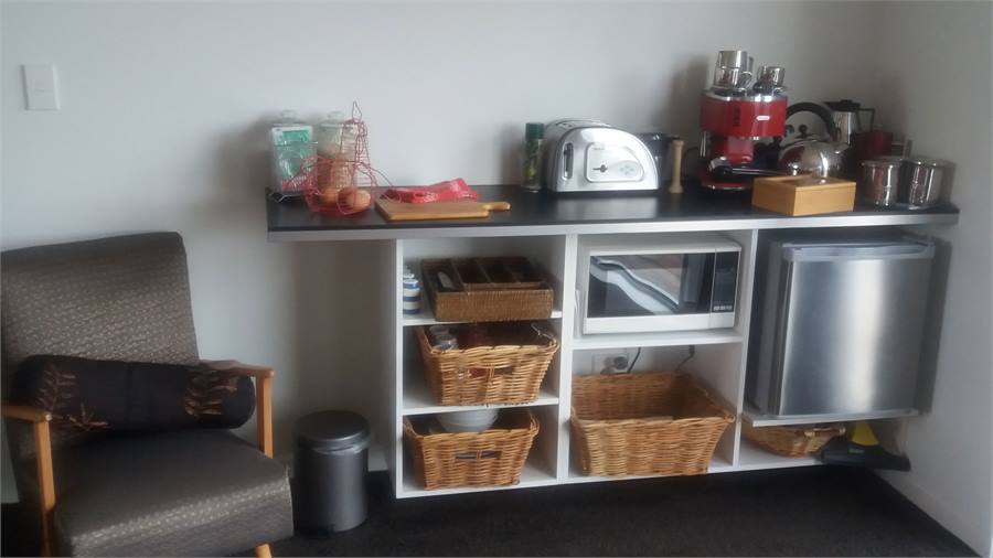 kitchenette: espresso machine, toaster, microwave,