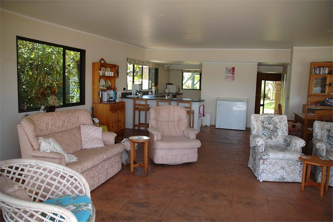 Living room looking towards kitchen area