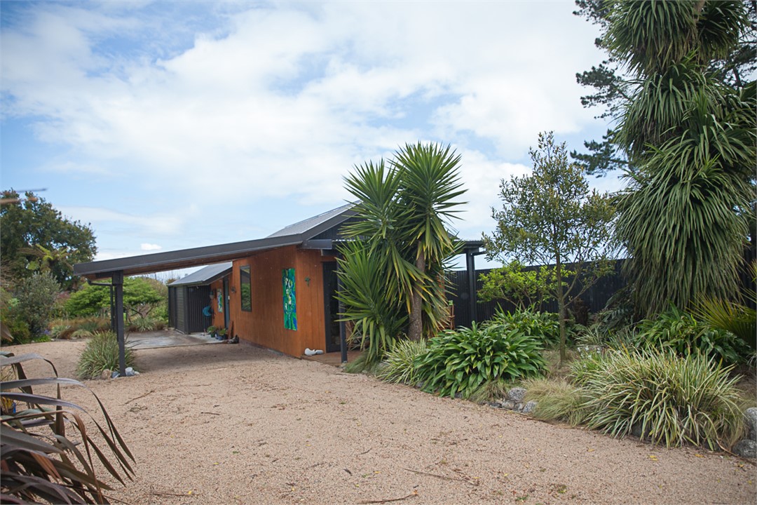 The Honey House exterior with carport