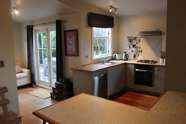 Kitchen and sun area beyond