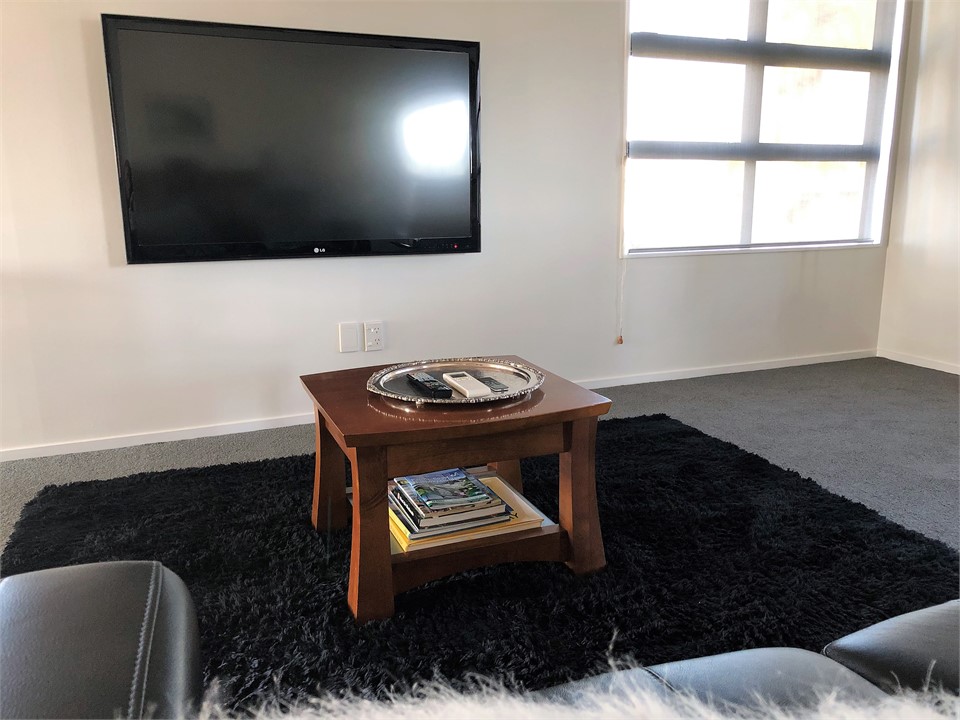 Lounge - Large screen TV with AppleTV