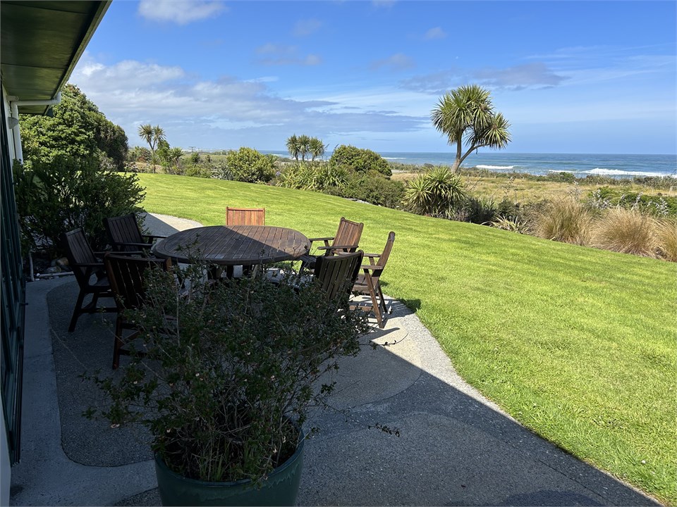 Outdoor setting facing the sea.