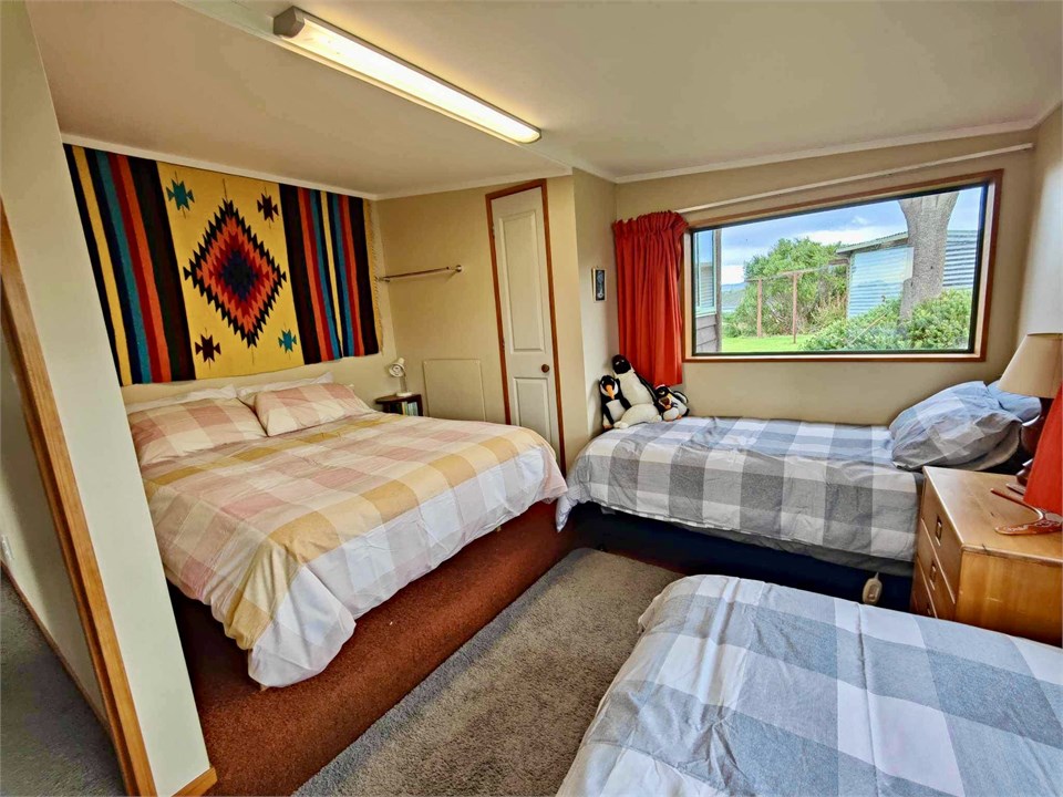 Bedroom 2 - queen sized bed, two single beds, afte