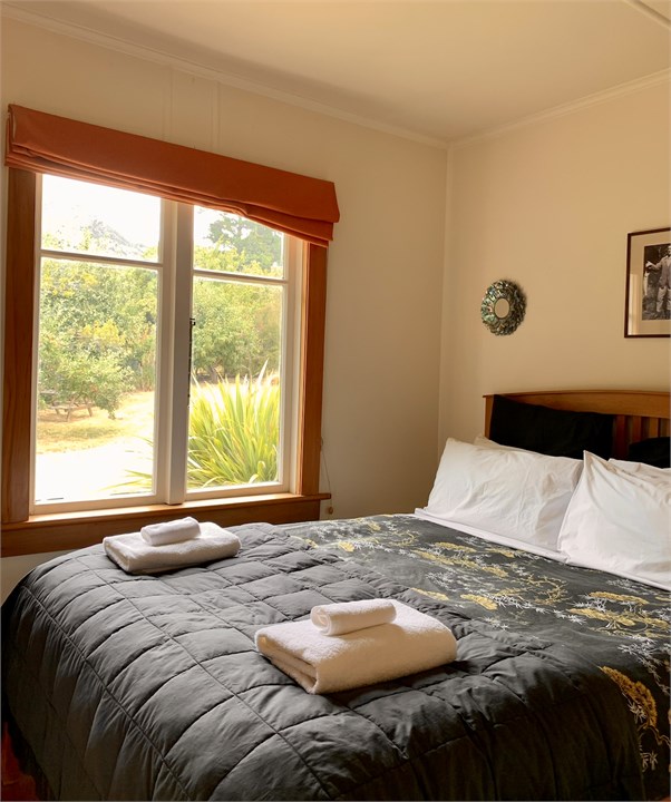 This is the second bedroom with views of the backy