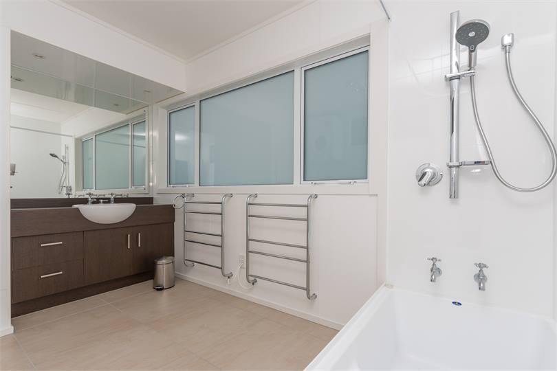 Bathroom One with Sep Toilet and Laundry