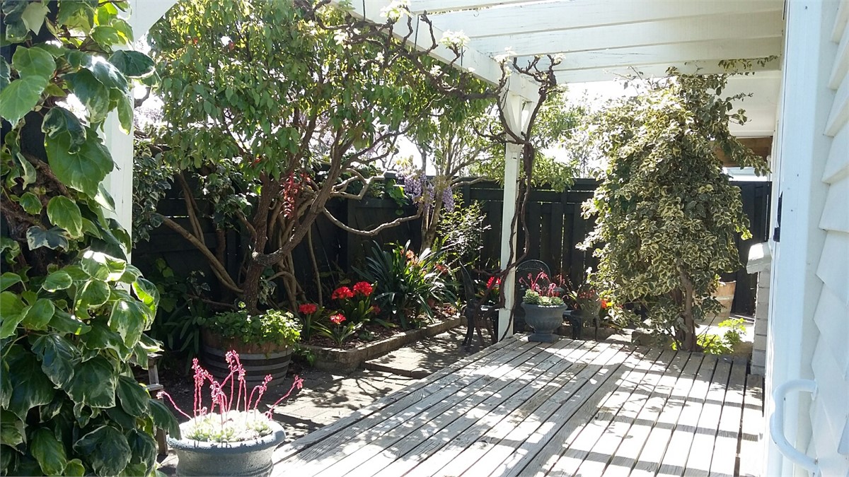 private and sheltered front courtyard