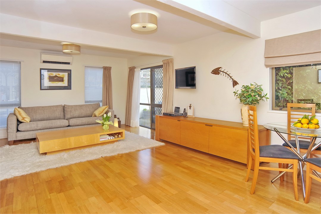 Living area has a TV and seating areas