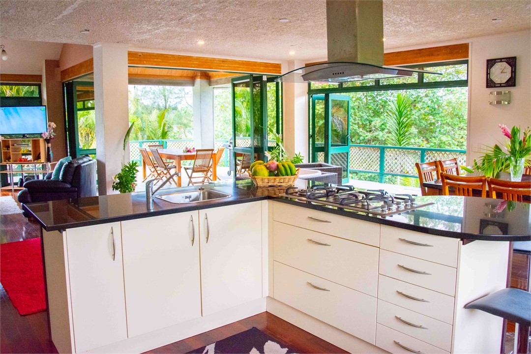 Open living and kitchen area on the upper floor