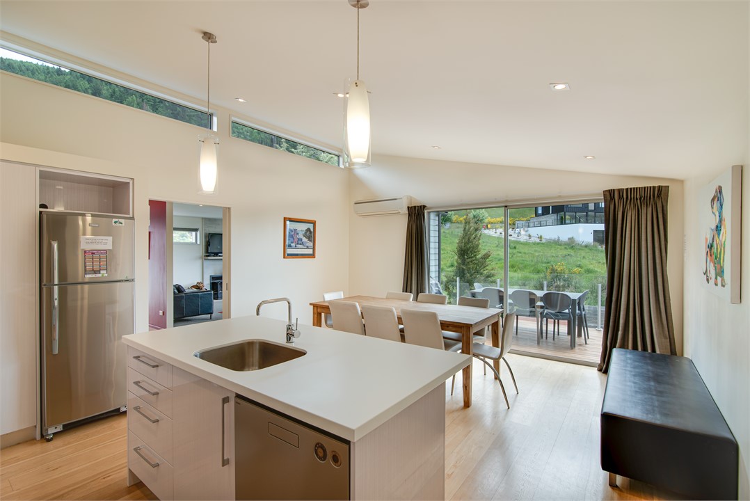 Kitchen - opens to balcony with seating & bbq