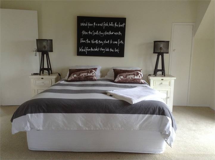 First Bedroom with King Bed and 2 Singles and a st