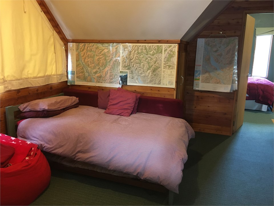 Extra bed with trundle bed underneath on mezzanine