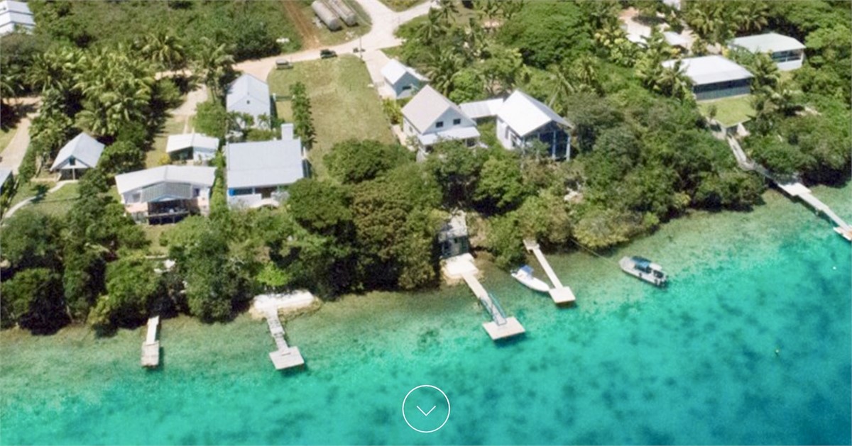 Aerial view it’s the whare with the front lawn on 