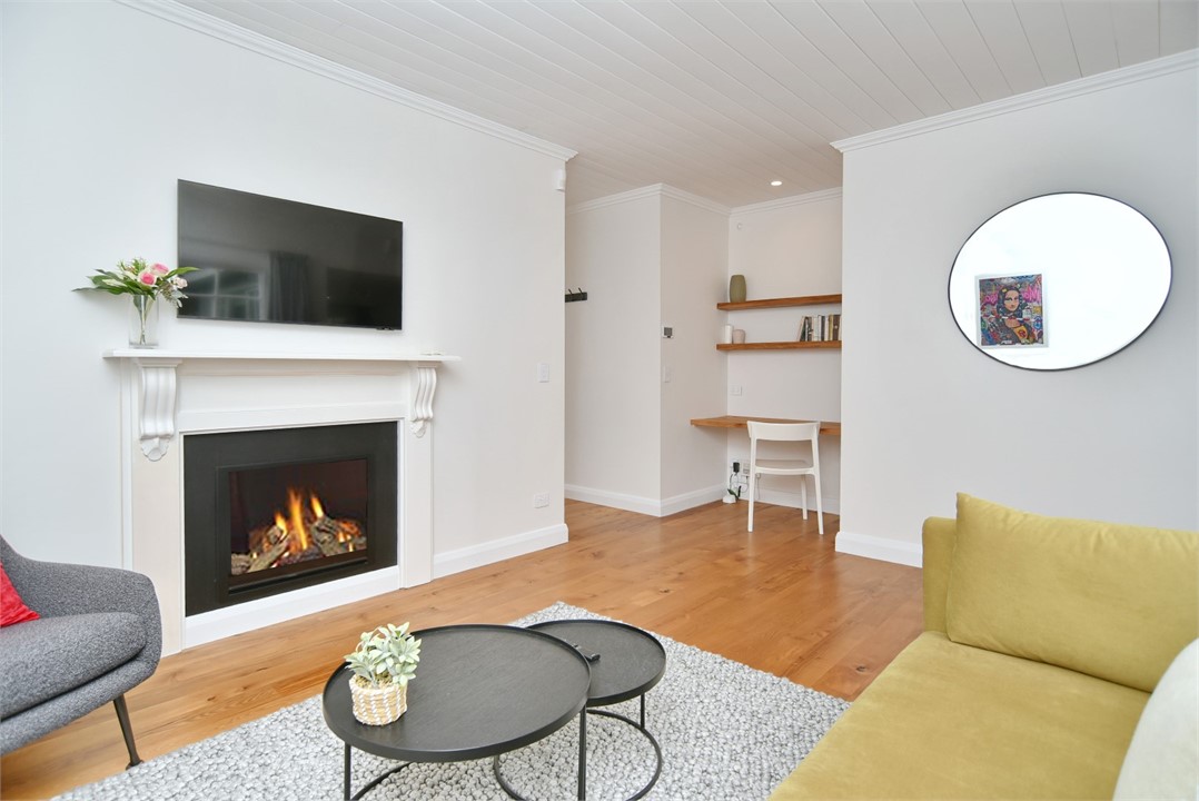 Living area with TV and gas fire