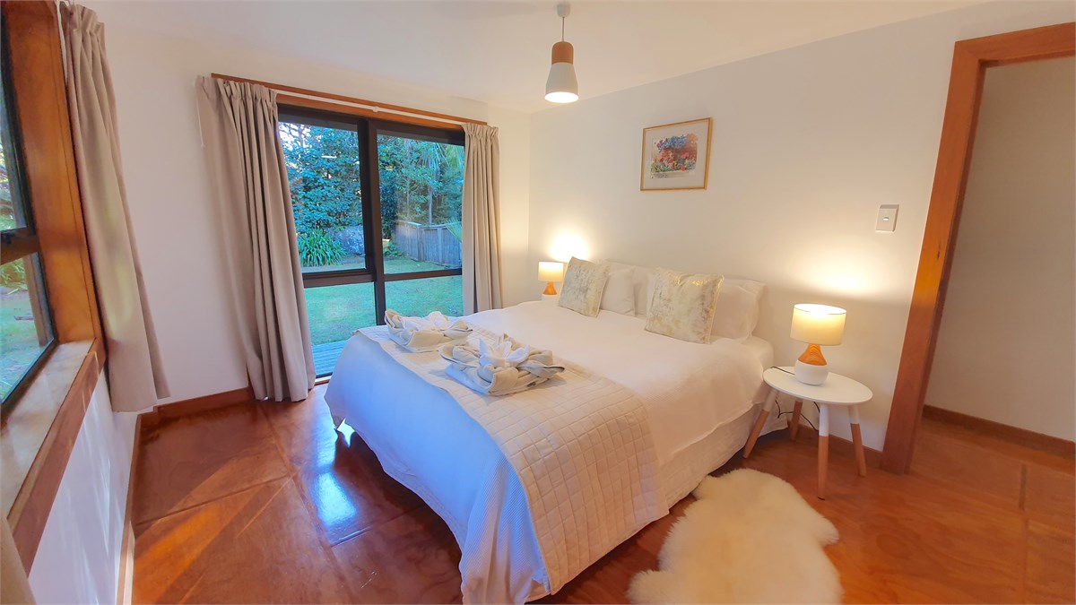 Master bedroom with king bed and en suite bathroom