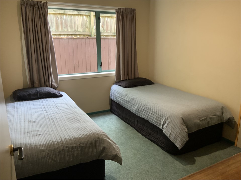 Twin Singles Downstairs Bedroom