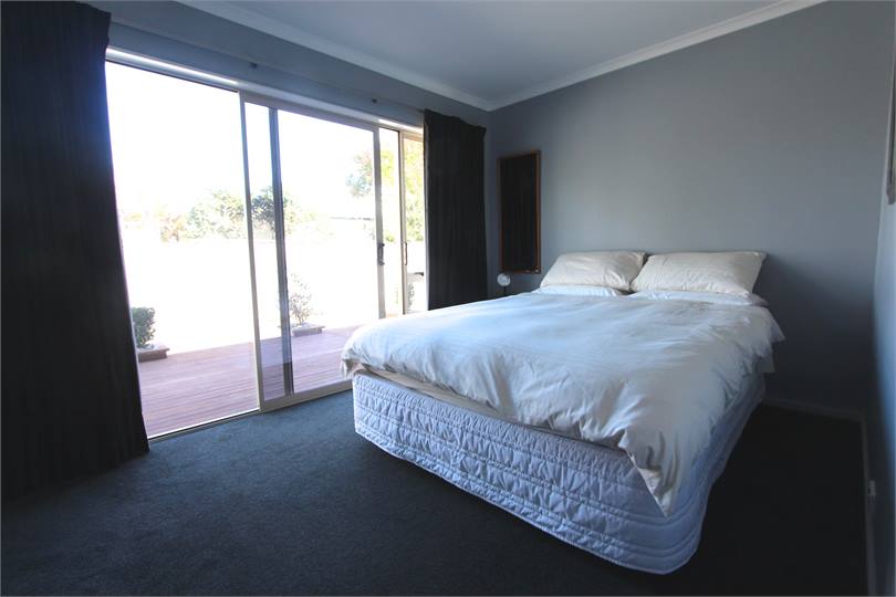 Second bedroom with own access to sunny deck