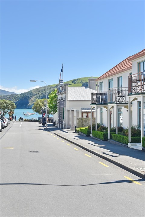 Driveway entrance on right about halfway in photo