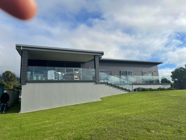 Outside spaces overlooking garden and out to sea