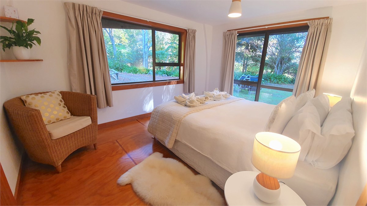 Master bedroom with king bed and en suite bathroom