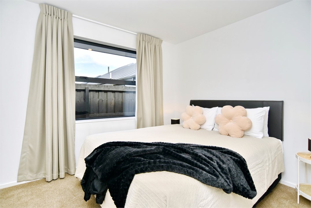 Bedroom 2 has a Queen bed