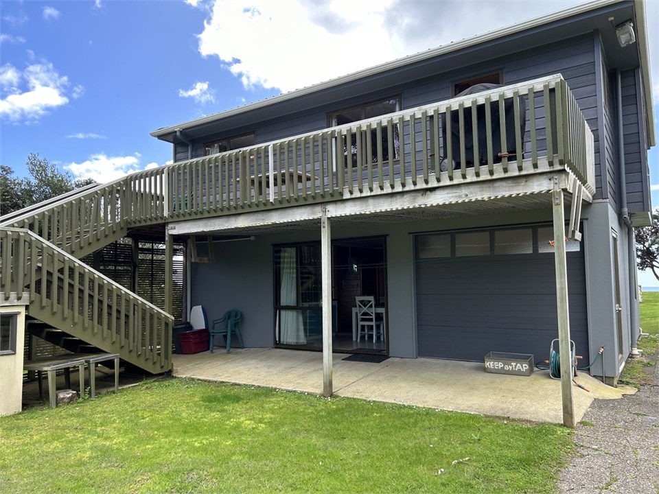 Back deck with Weber BBQ and ample parking area