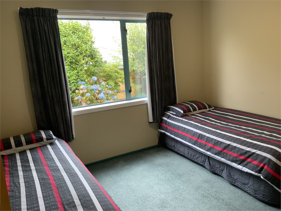 Twin Singles Downstairs Bedroom