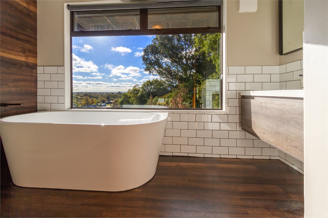 Recently renovated bathroom featuring spectacular 