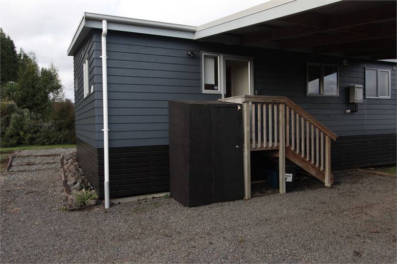 Ski/Snowboard shed and carport.