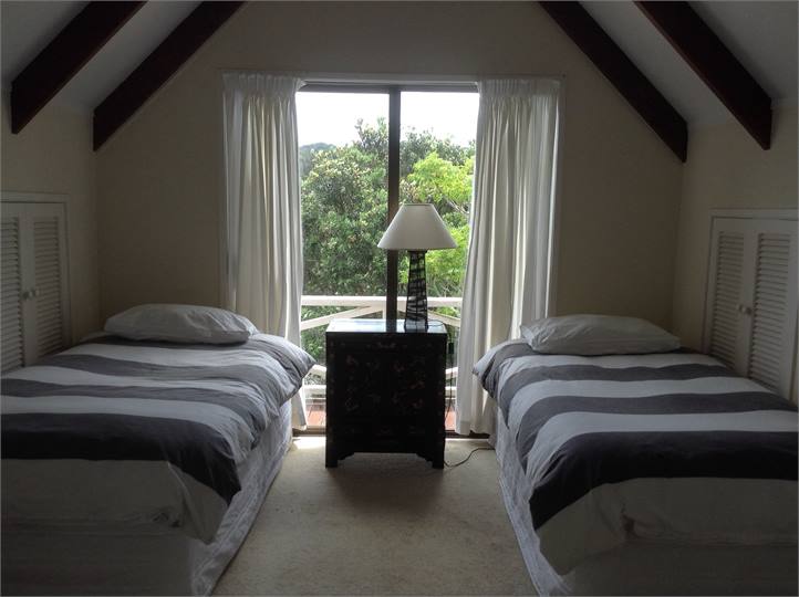 First bedroom with King Bed and 2 singles