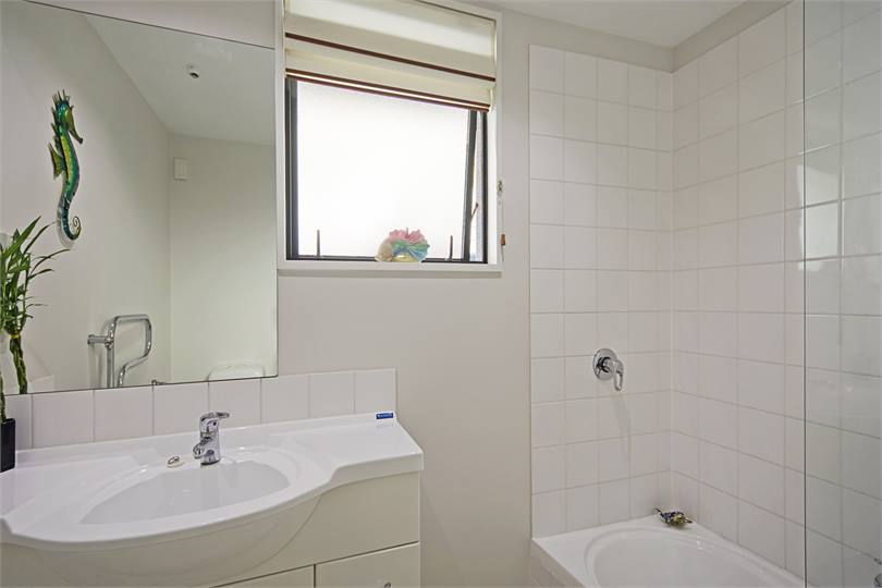 Separate Bathroom with Shower over Bath, Toilet & 